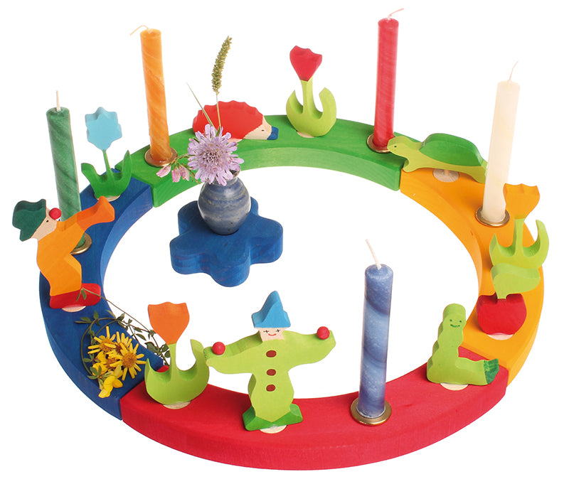 Grimm's 16-Hole Coloured Wooden Celebration Ring with candles and decorative figures