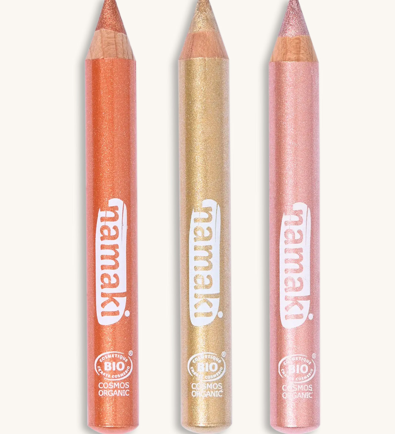 Set of 3 Namaki light glitter make up pencils on a cream background