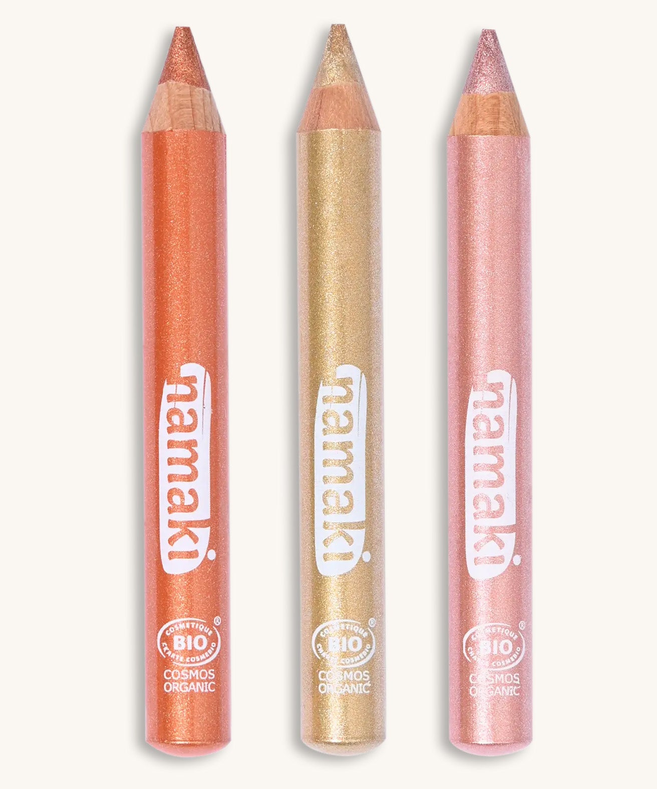 Set of 3 Namaki light glitter make up pencils on a cream background