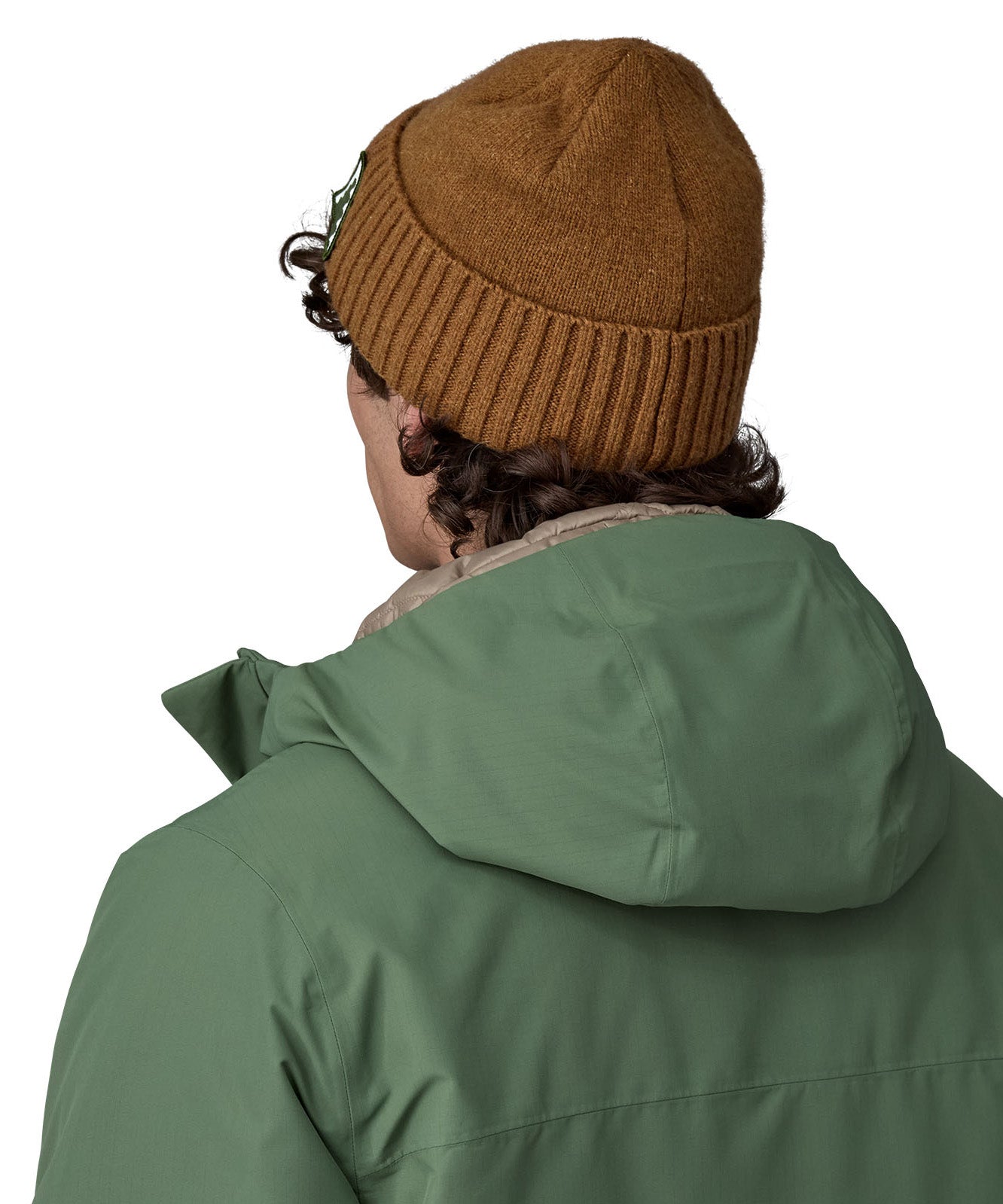 A close up of the back of the brown beanie.