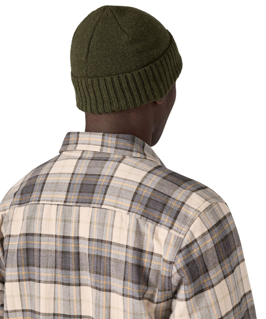 The back of the green beanie