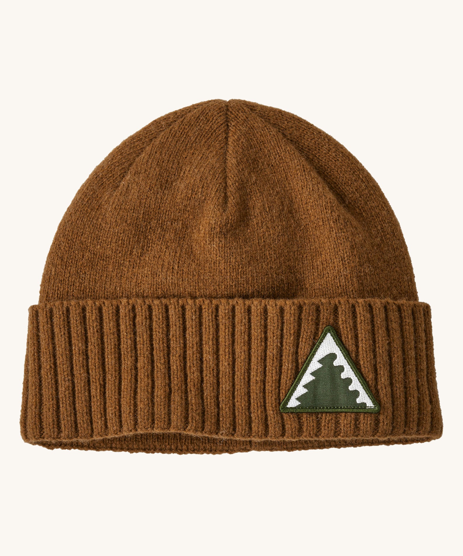 A brown Patagonia beanie with a triangle logo on the front on a cream background.