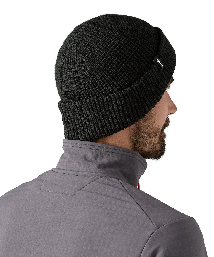 The back of the plain black Patagonia beanie.