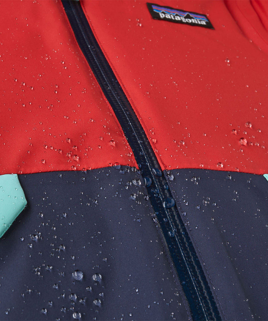 A close up of jacket with water dripping off