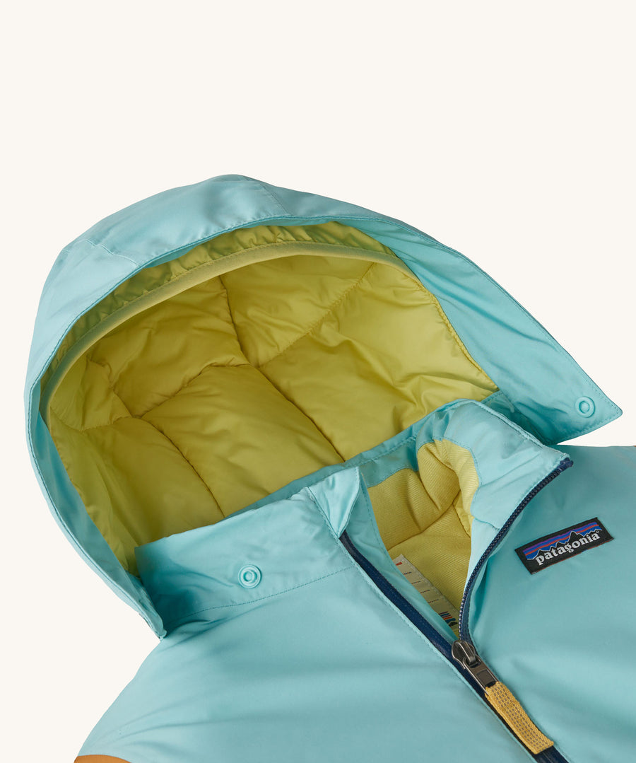 A close up of the hood on the all in one snowsuit