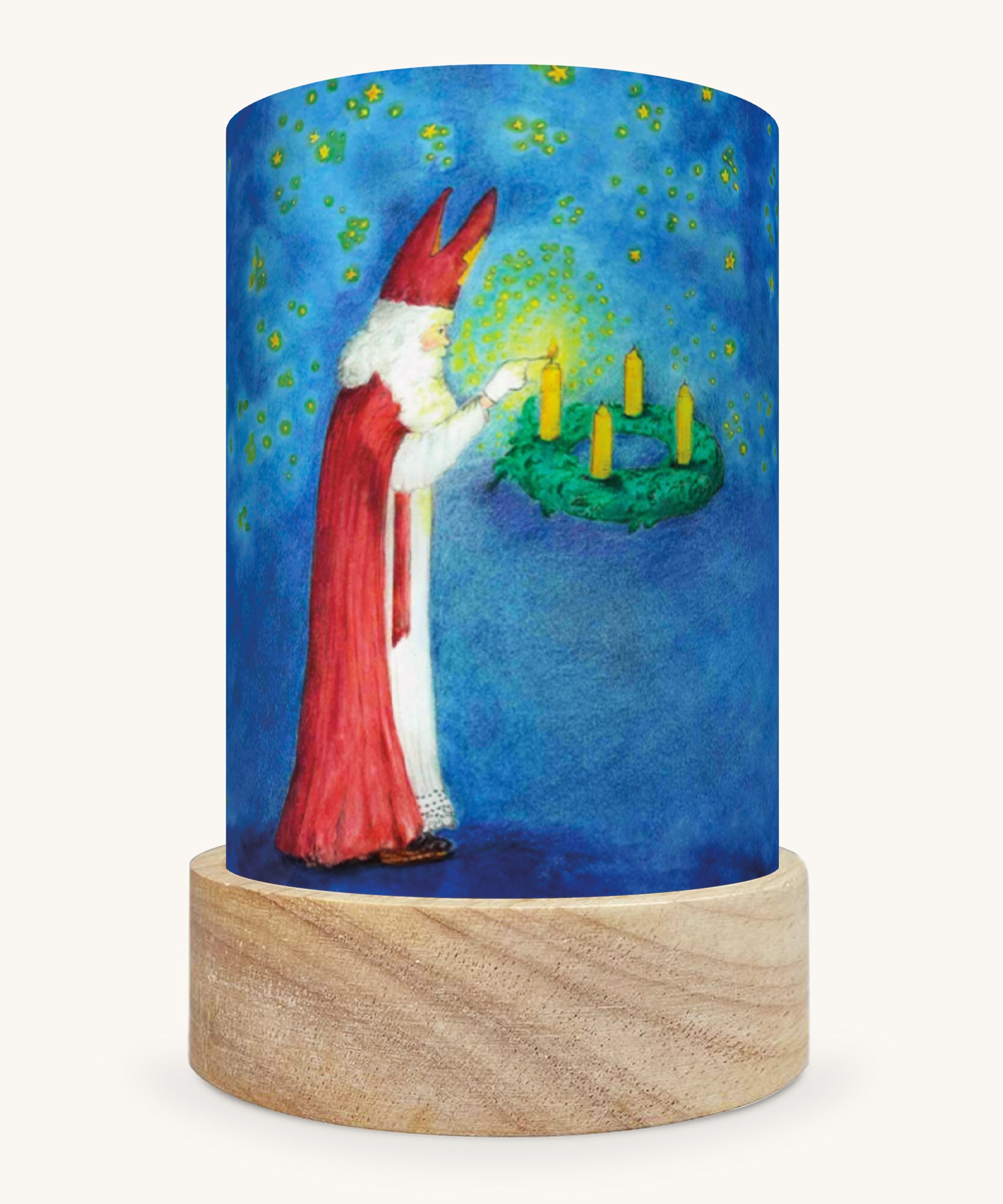 The Advent Light illustration by Eentje Van Margo sat in a Toverlux Magic Lantern base, on a cream background