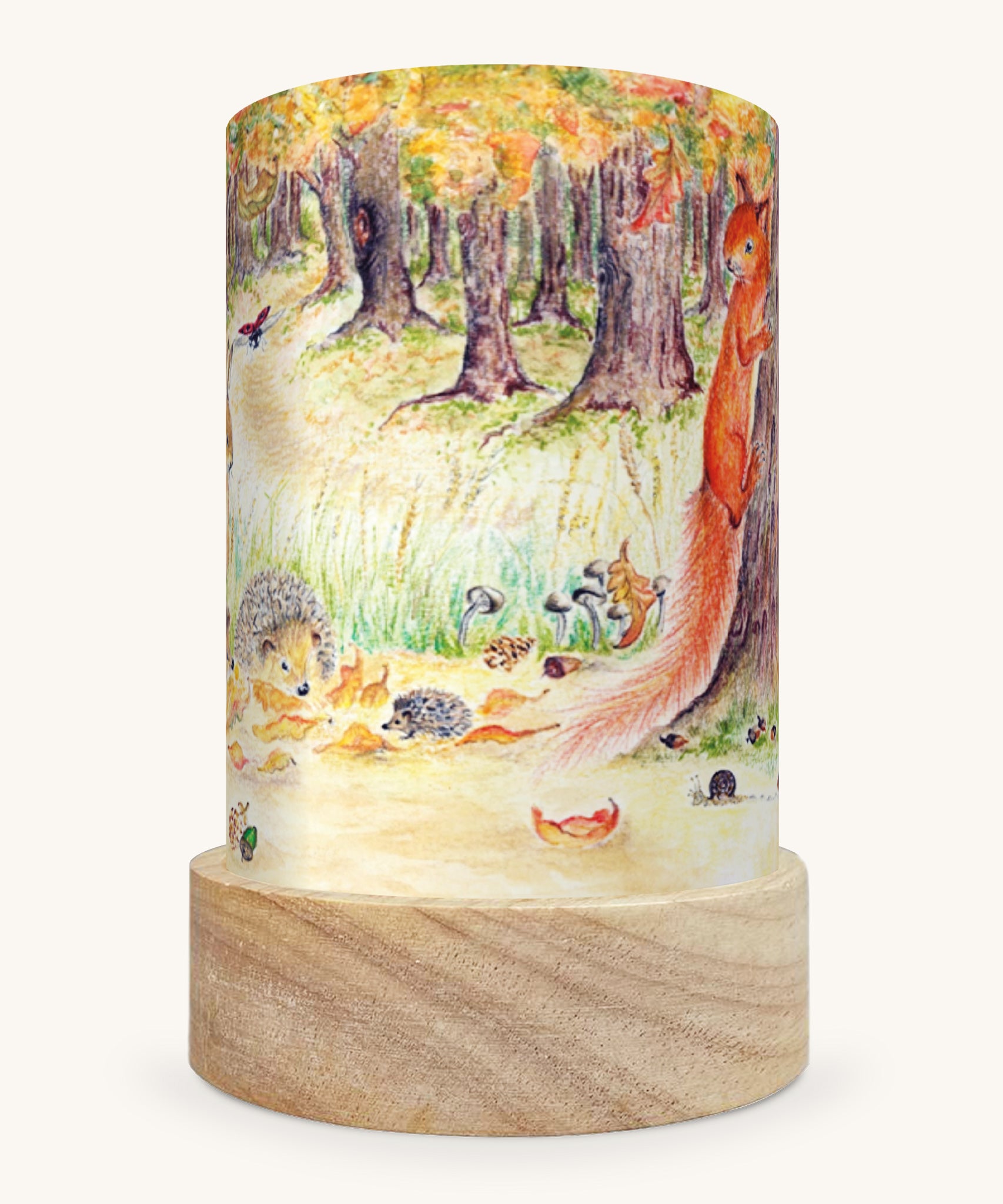 The Autumn Bliss illustration by Eentje Van Margo sat in a Toverlux Magic Lantern base, on a cream background