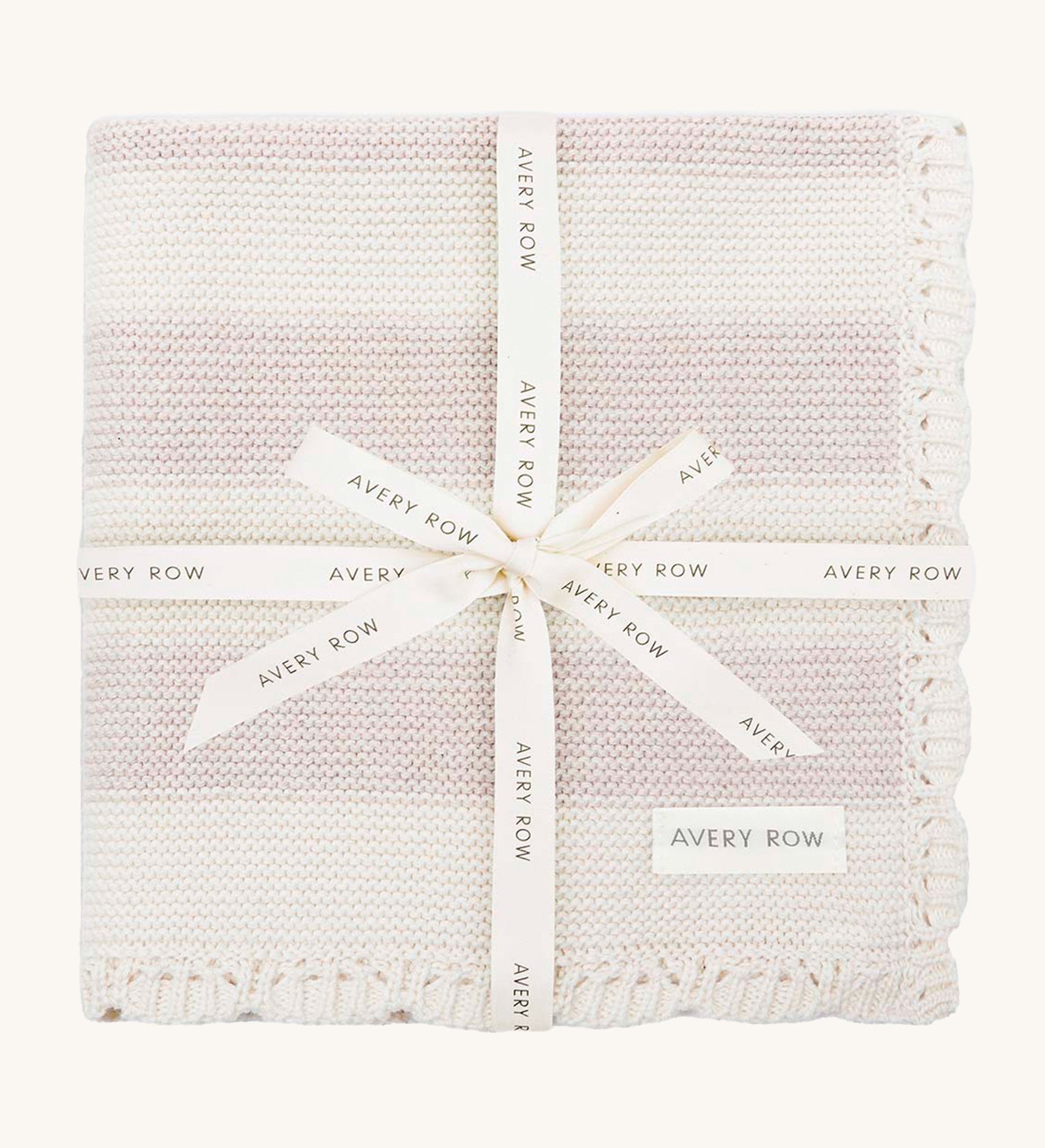 Avery Row Stripe Knit Organic Baby Blanket - Oat Melange, a knitted white and oatmeal stripe baby blanket wrapped in a branded gift ribbon. 