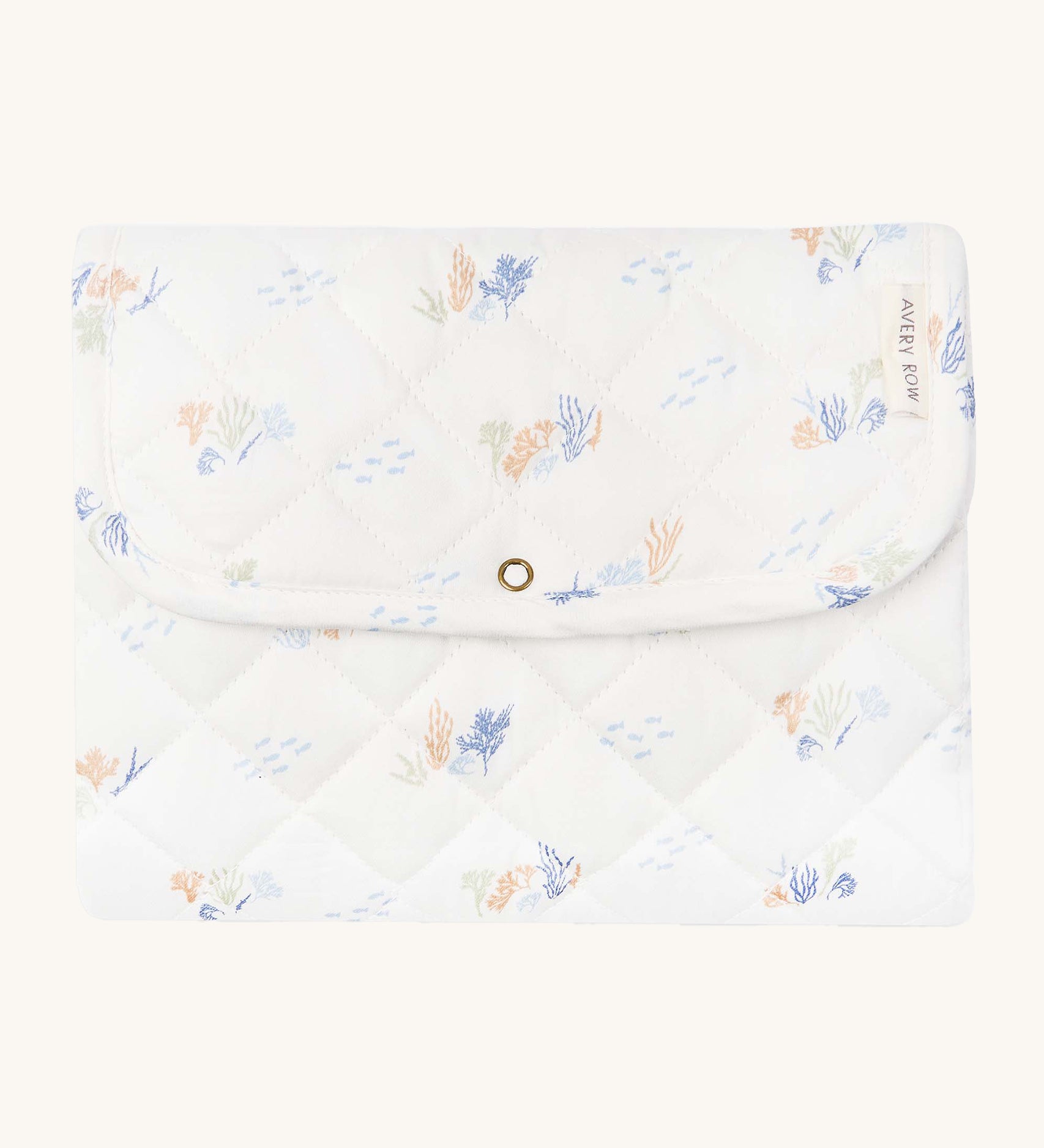 Avery Row Travel Changing Mat - Coastline, a white padded changing mat with delicate seaweed print in soft pastel tones.