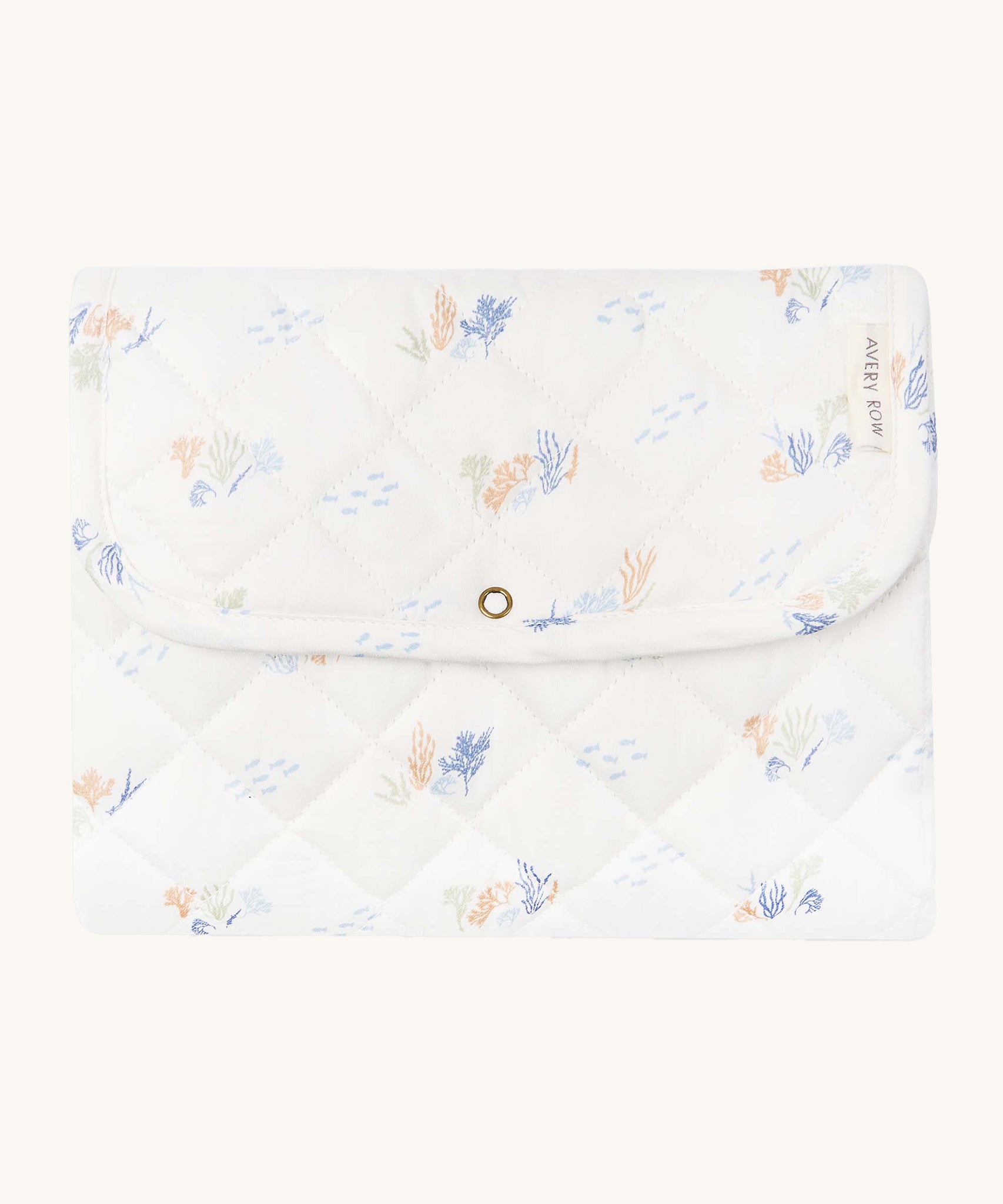 Avery Row Travel Changing Mat - Coastline, a white padded changing mat with delicate seaweed print in soft pastel tones.