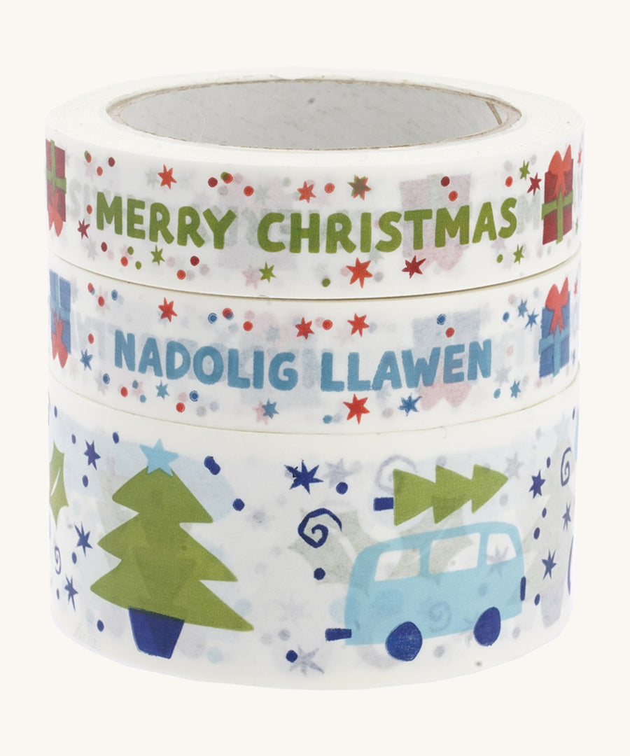 Babipur Kraft Eco Paper Tape, in a stack with festive prints. On a cream background