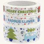 Babipur Kraft Eco Paper Tape, in a stack with festive prints. On a cream background