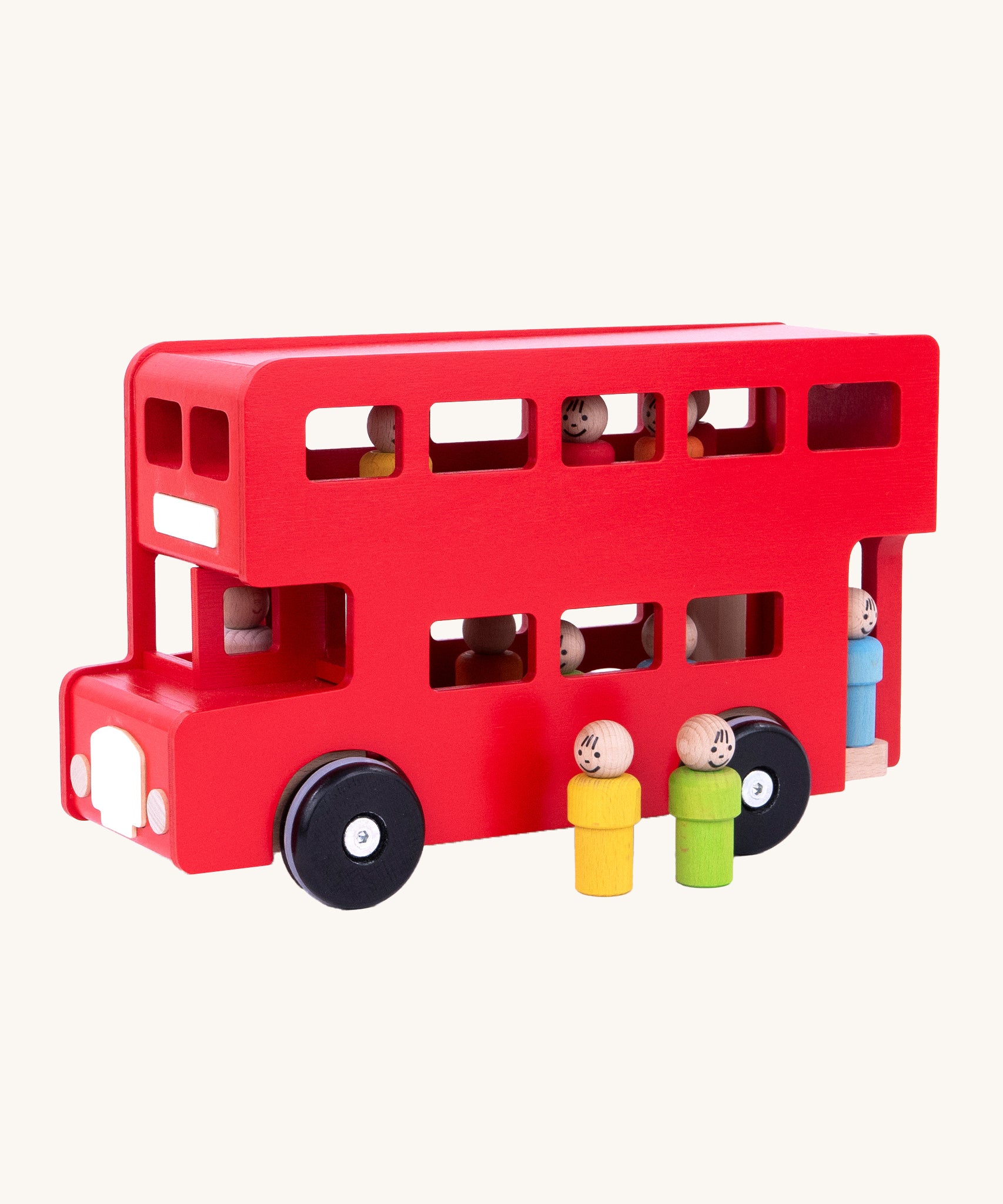 Another side view of the colourful peg dolls stood outside the bus, with other peg doll passengers and the peg doll driver inside, on a cream background