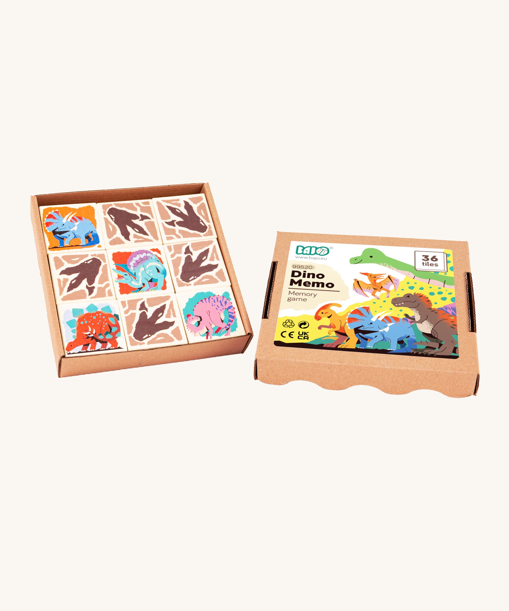 The Bajo Dinosaur Memory Game blocks inside its cardboard box, to show the product as a fun gift or toy to play with, on a cream background