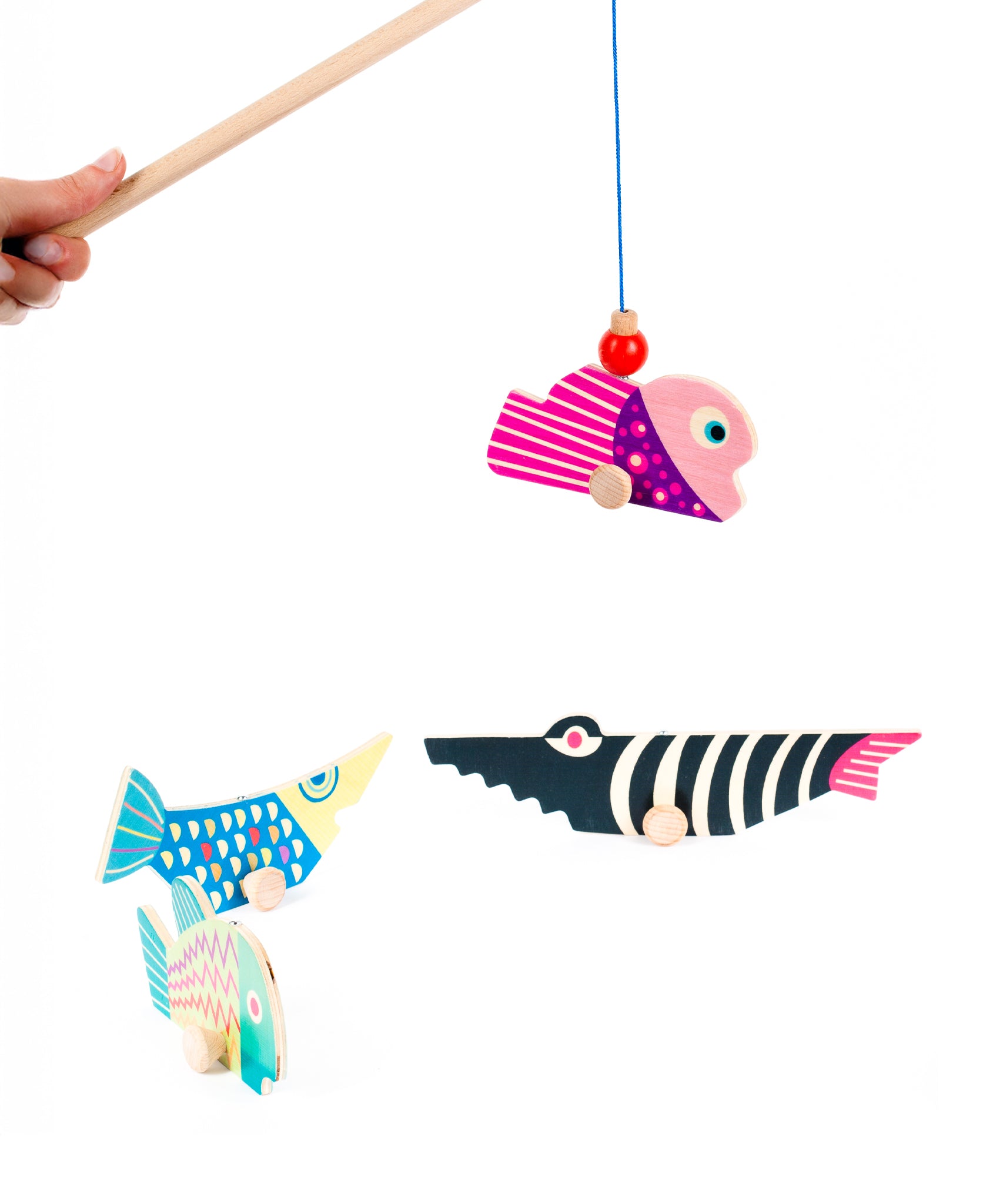 A closer look at the Bajo Magnetic Fishing Game pole, picking up a fish. On a white background