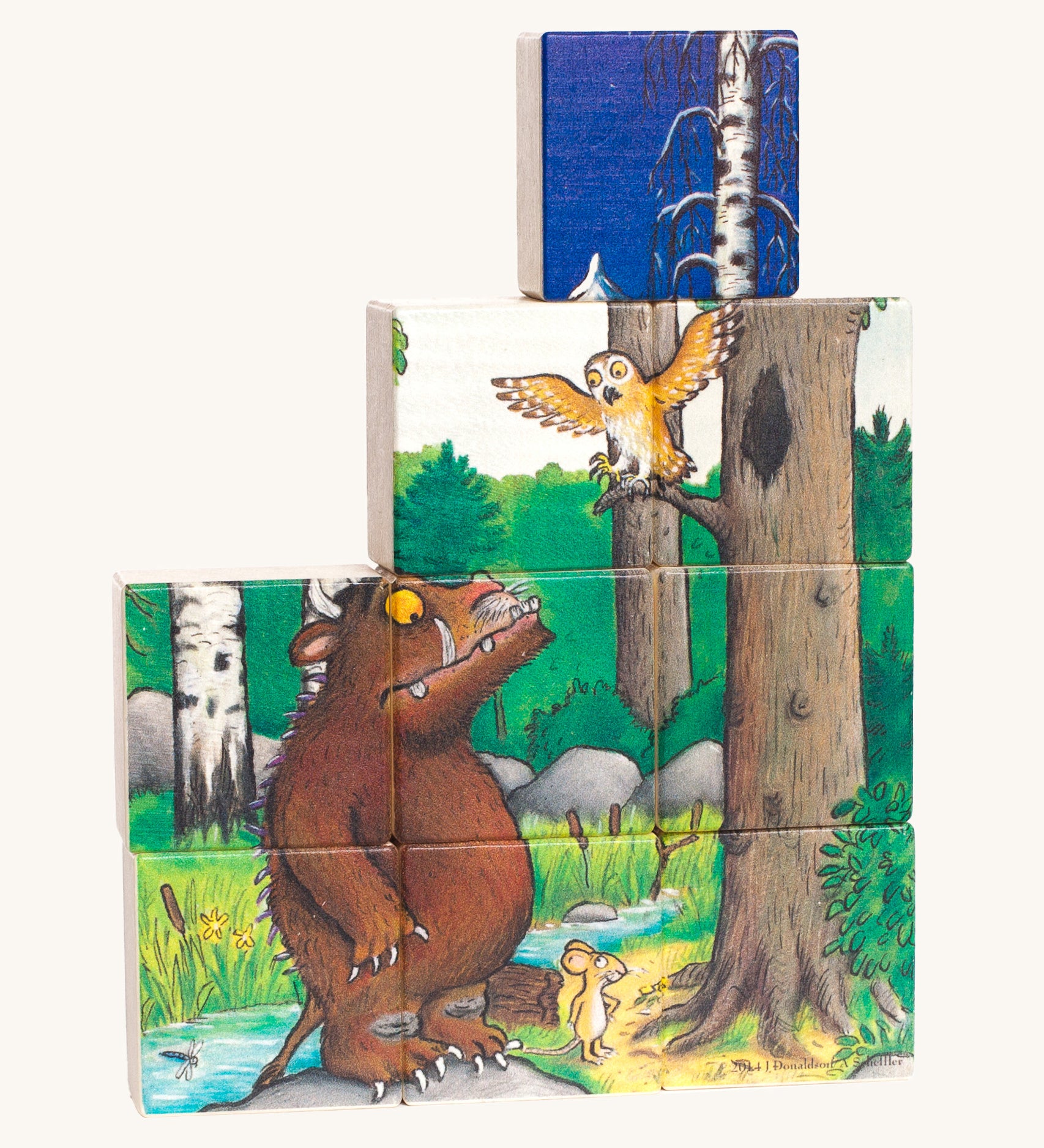 One side of the Bajo Gruffalo Wooden Block Puzzle showing a woodland scene of the Gruffalo and Owl, with a blue block on top showing the other side of the puzzle blocks