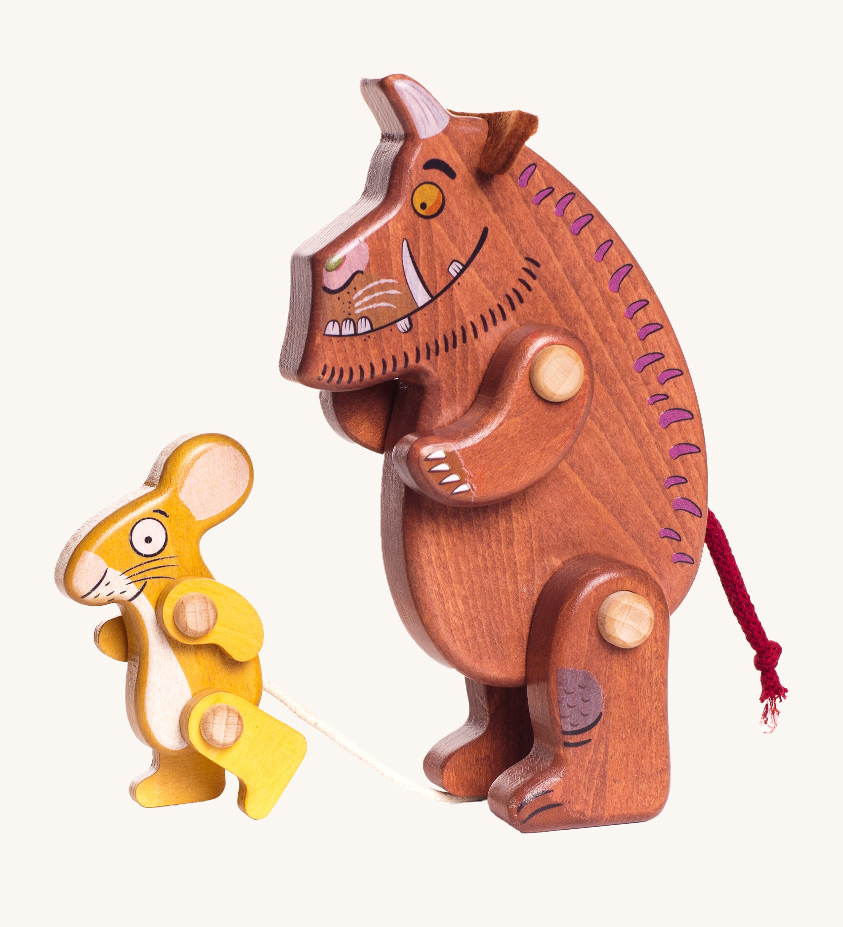 Bajo Gruffalo & Mouse Figures Set are a fun set of movable wooden figures which can move at the arms and legs. The yellow Mouse is on the left an the brown Gruffalo is on the right