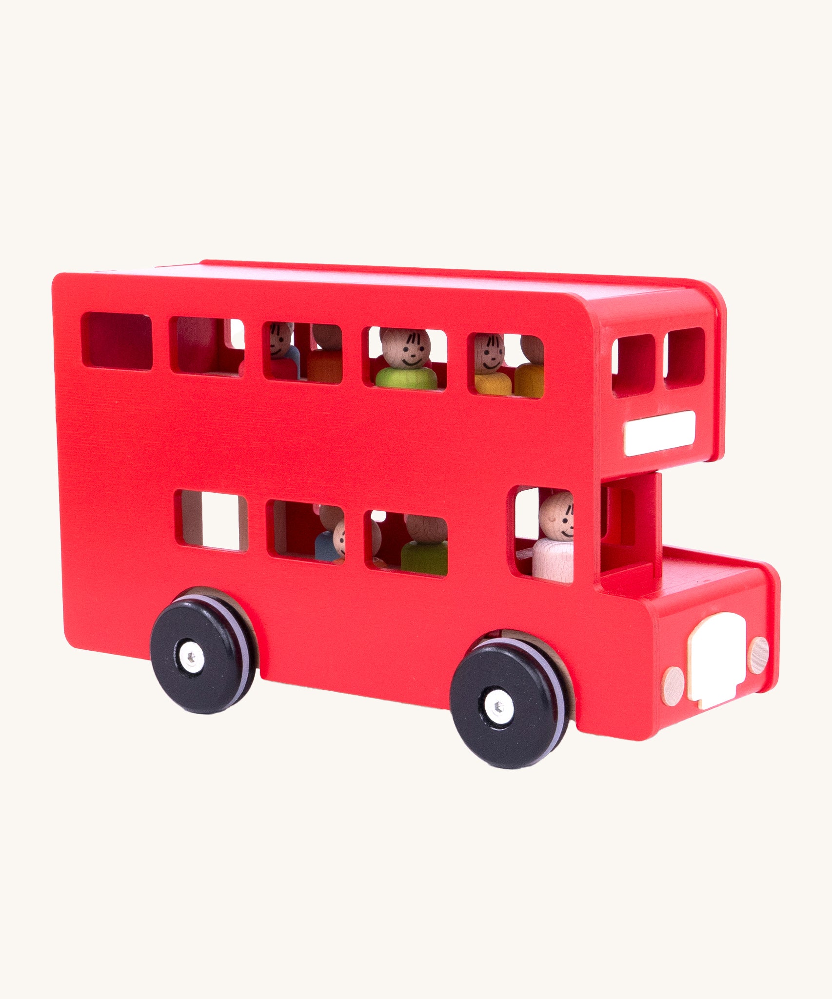 An image from the side of the Red Bajo London Bus, with colourful wooden peg dolls inside, on a cream background