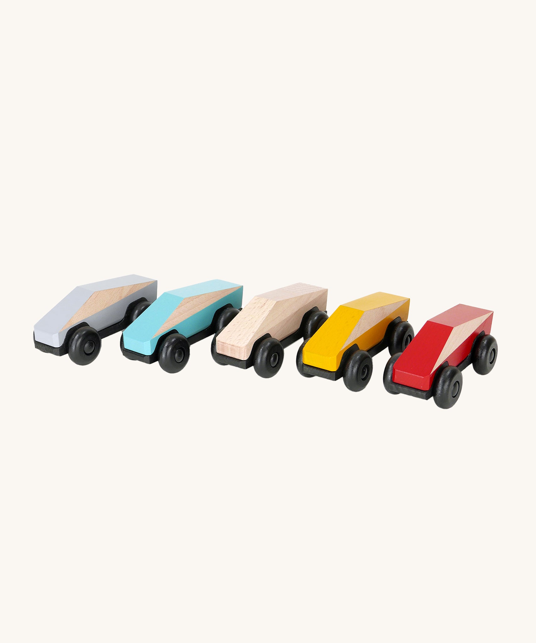 The Bajo Tobe Poly cars, in a row on a cream background