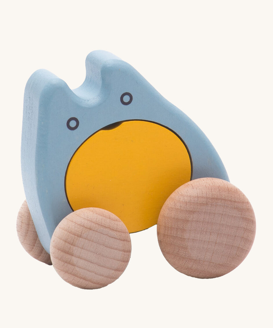 Bajo children's plastic-free wooden push along ghost toy in the blue and yellow colour on a cream background