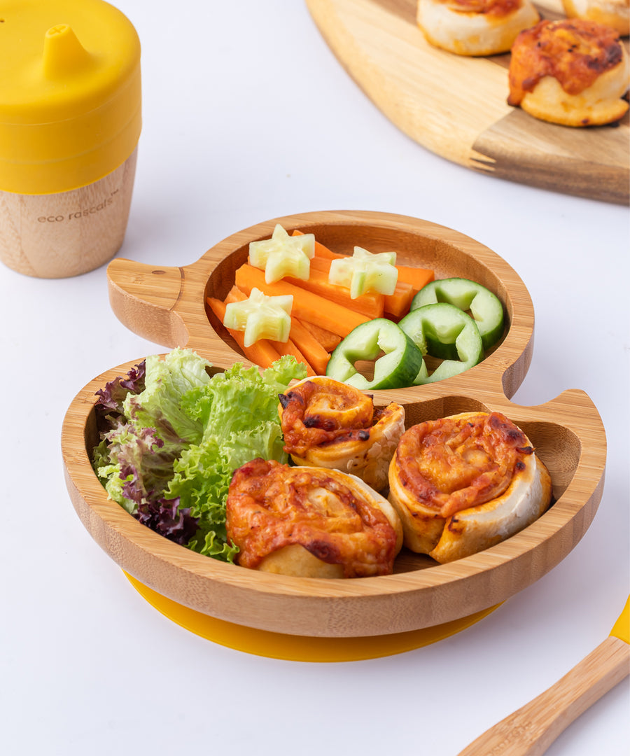 Eco Rascals Duck Bamboo Suction Plate, with carrot sticks, salad and pastry swirls. 