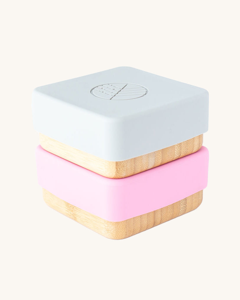 Eco Rascals Bamboo Snack Pots Two Pack with white and pink silicone lids.