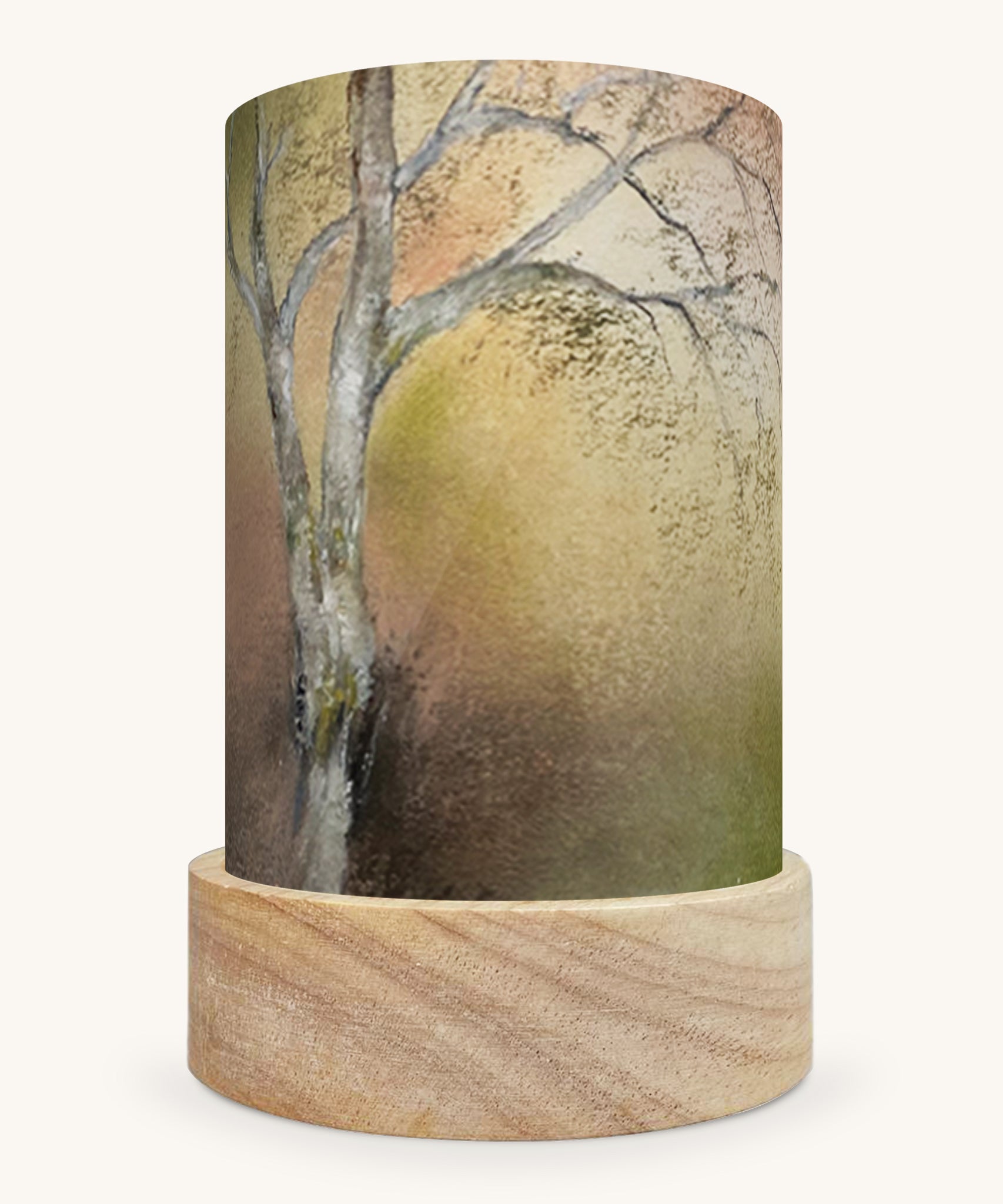 The Birch Tree illustration by Baukje Exler sat in a Toverlux Magic Lantern base, on a cream background