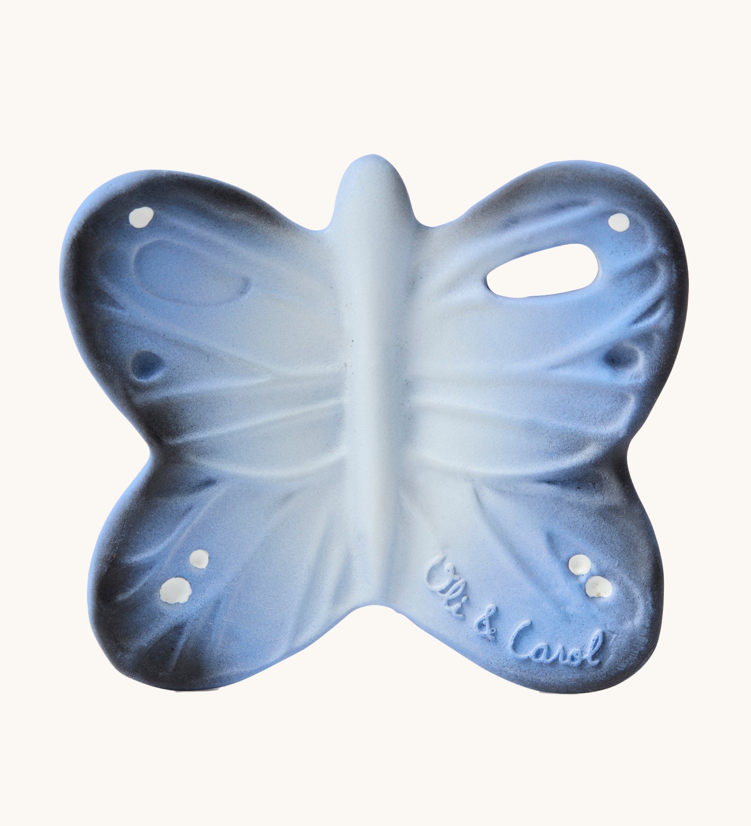 Oli & Carol Natural Rubber Mini Teether - Blues The Butterfly, showing a blue butterfly teether on a cream background