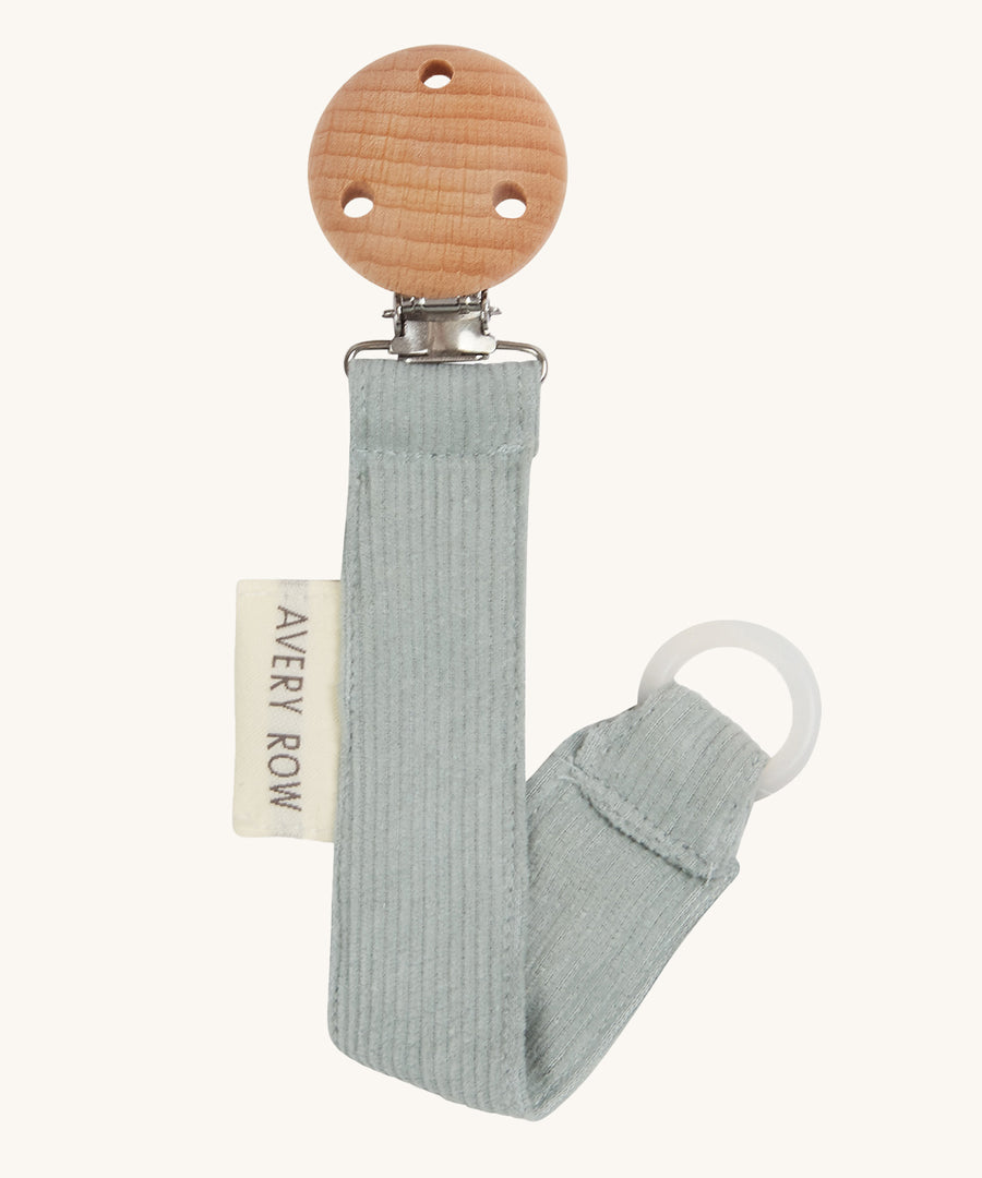 Avery Row Pacifier Holder - Blue Corduroy, showing the silicone ring and wooden clip