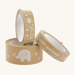 Stack of three babipur design kraft paper tapes with Happy Birthday, Camping and Elephant on a cream background