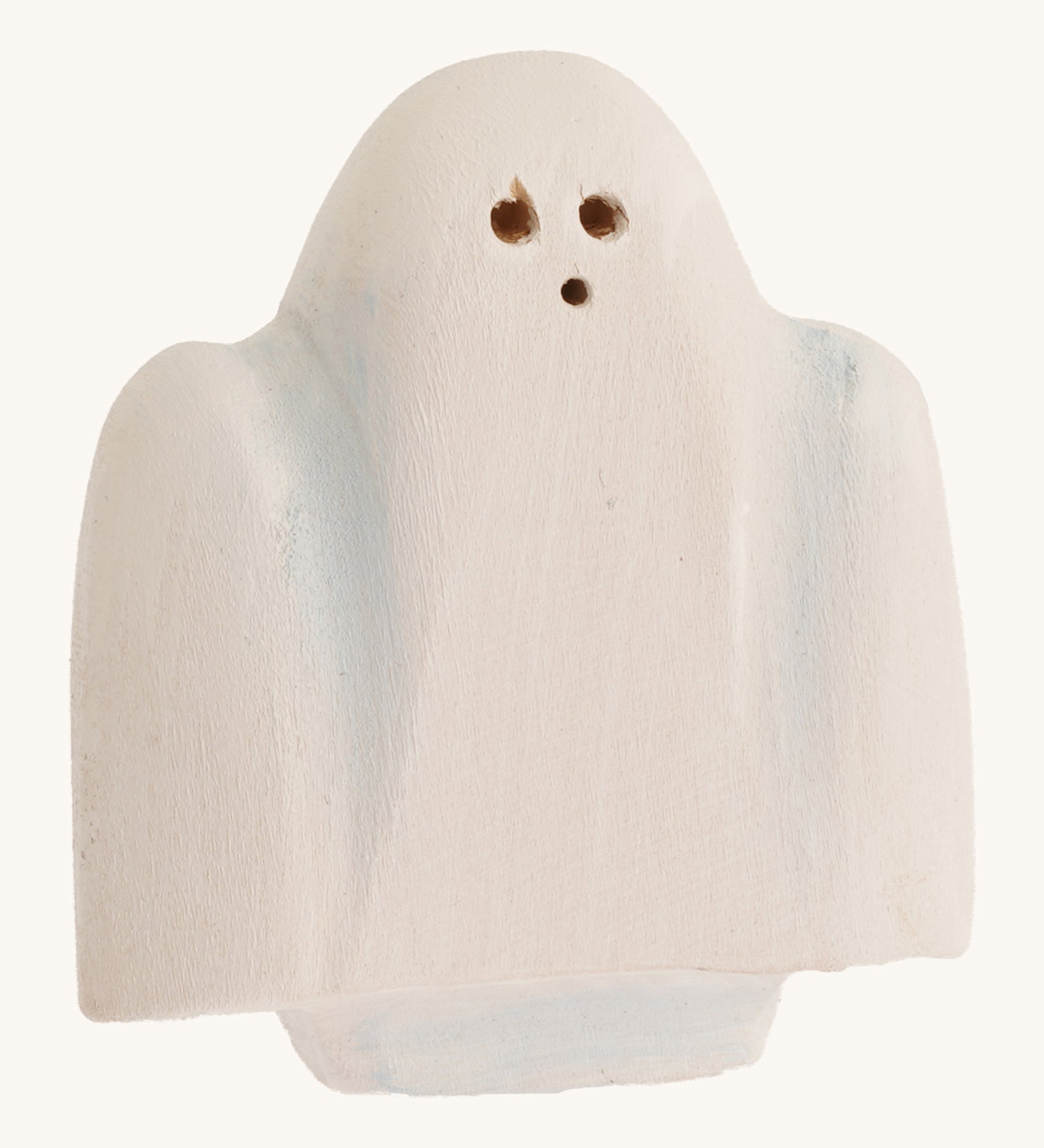 Bumbu wooden ghost figure on a plain background.