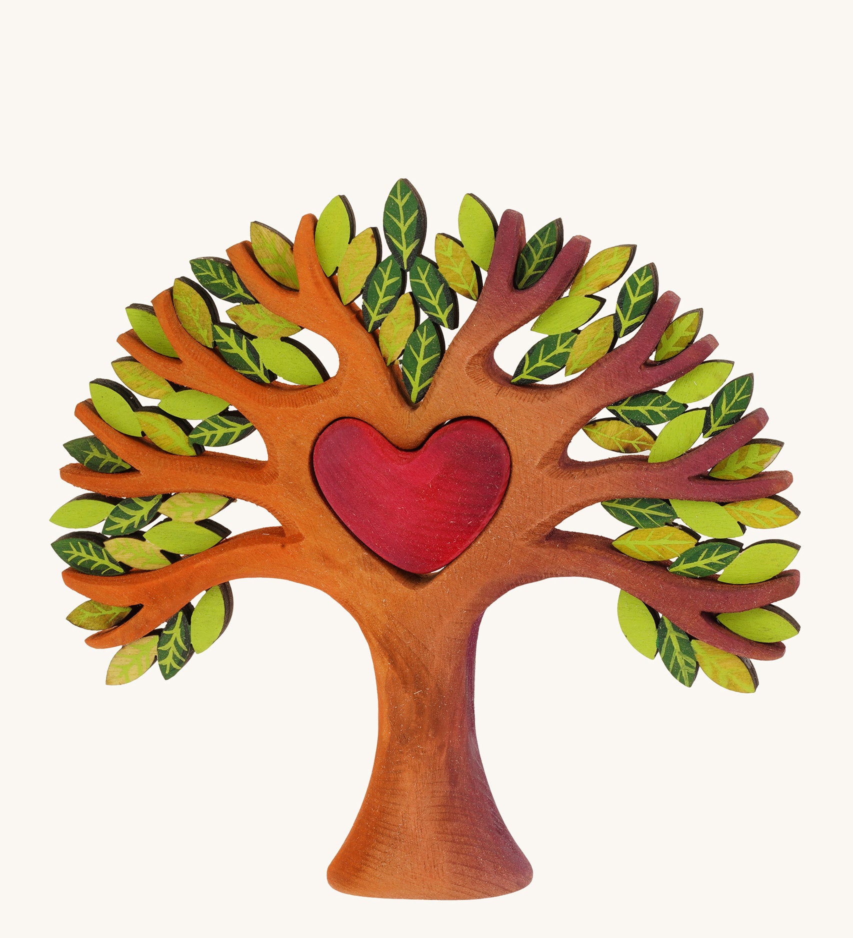 Bumbu wooden heart tree on a plain background.