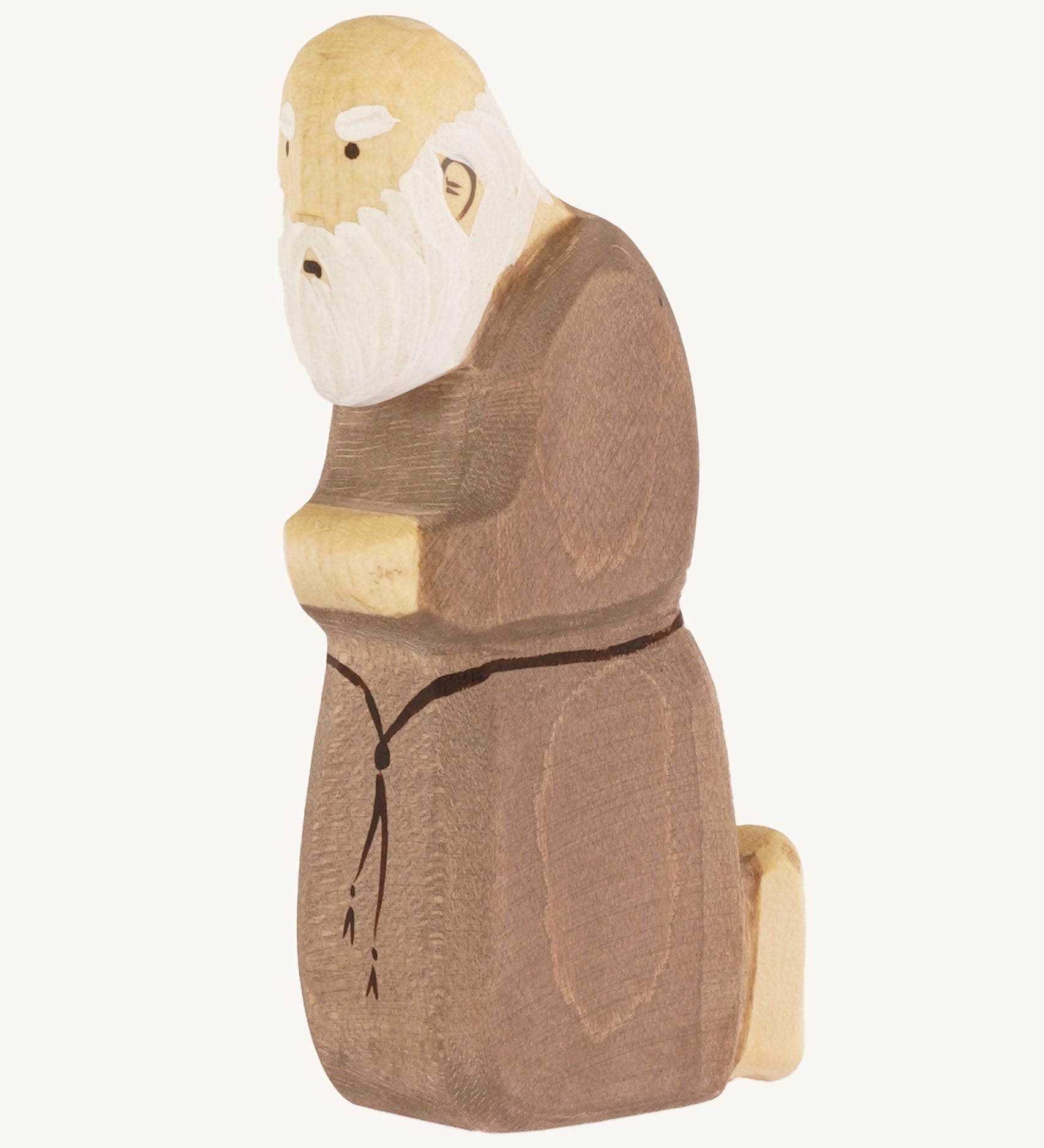 Bumbu Wooden Joseph Nativity Figure on a plain background. 