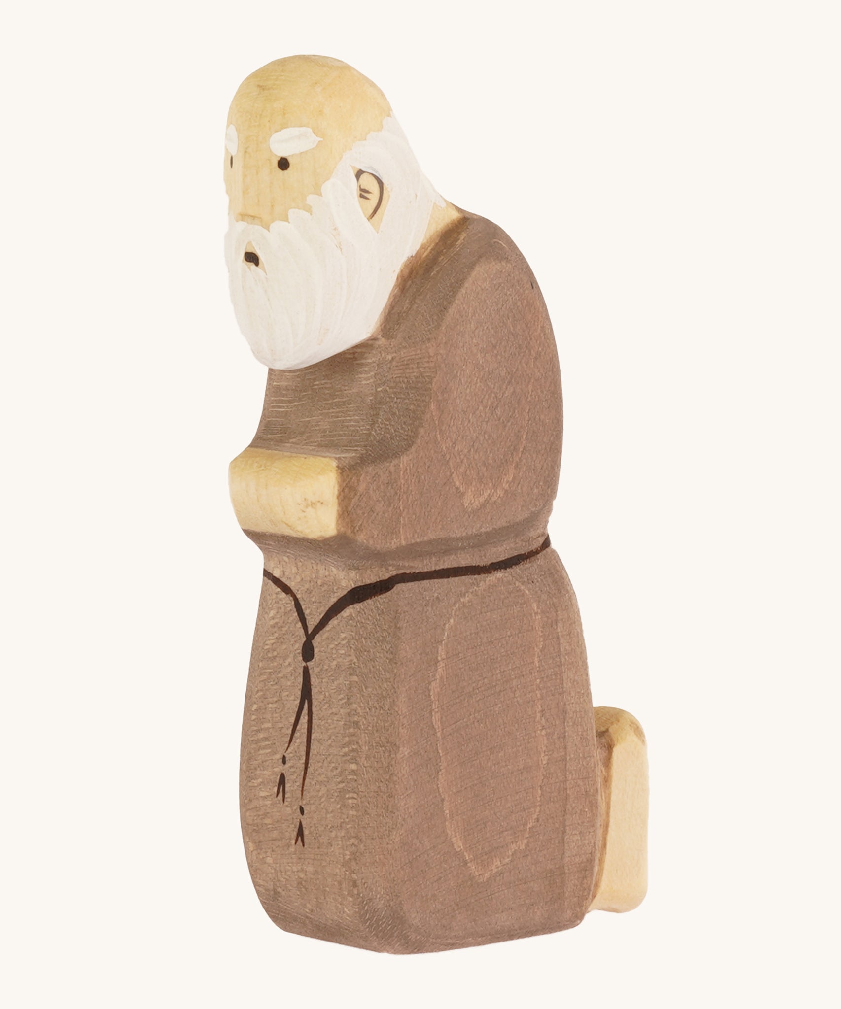 Bumbu Wooden Joseph Nativity Figure on a plain background. 