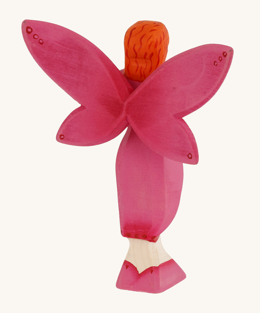 Bumbu Wooden Blossom Fairy on a plain background showing the back of the figure.  