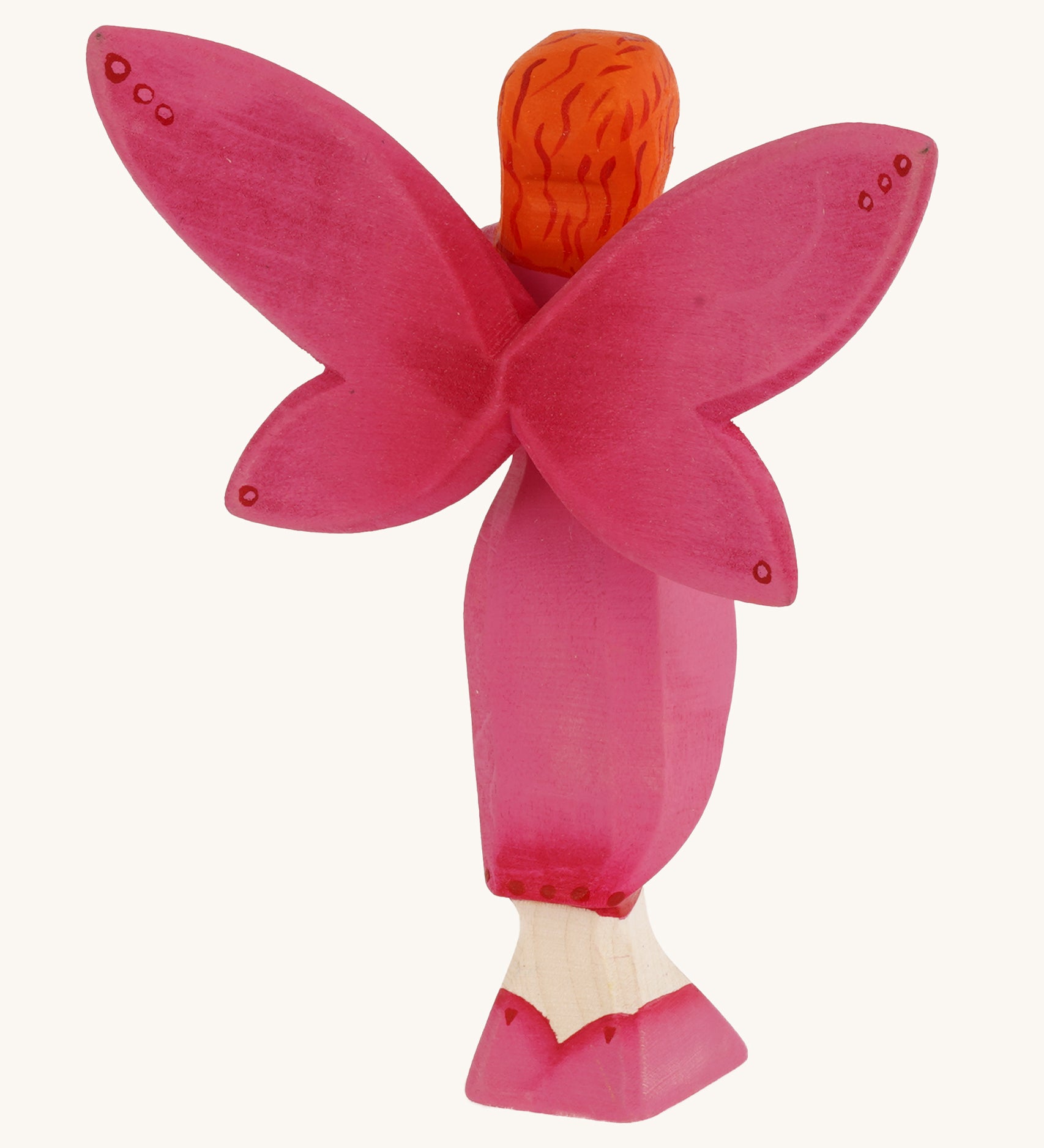 Bumbu Wooden Blossom Fairy on a plain background showing the back of the figure.  