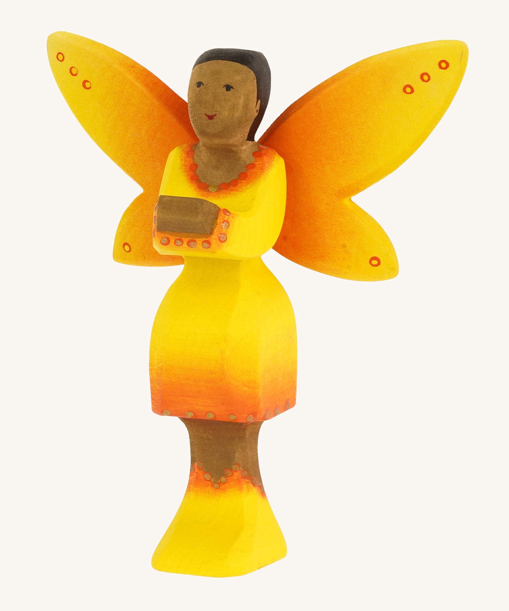 Bumbu Wooden Sunflower Fairy on a plain background.