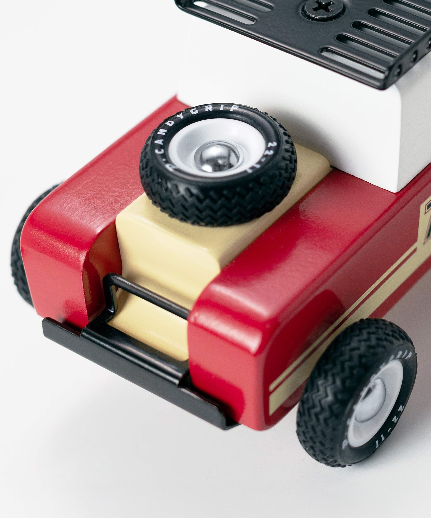 A top down view of the the front of the Candylab Drifter Nigel car, showing the tire and the wooden details