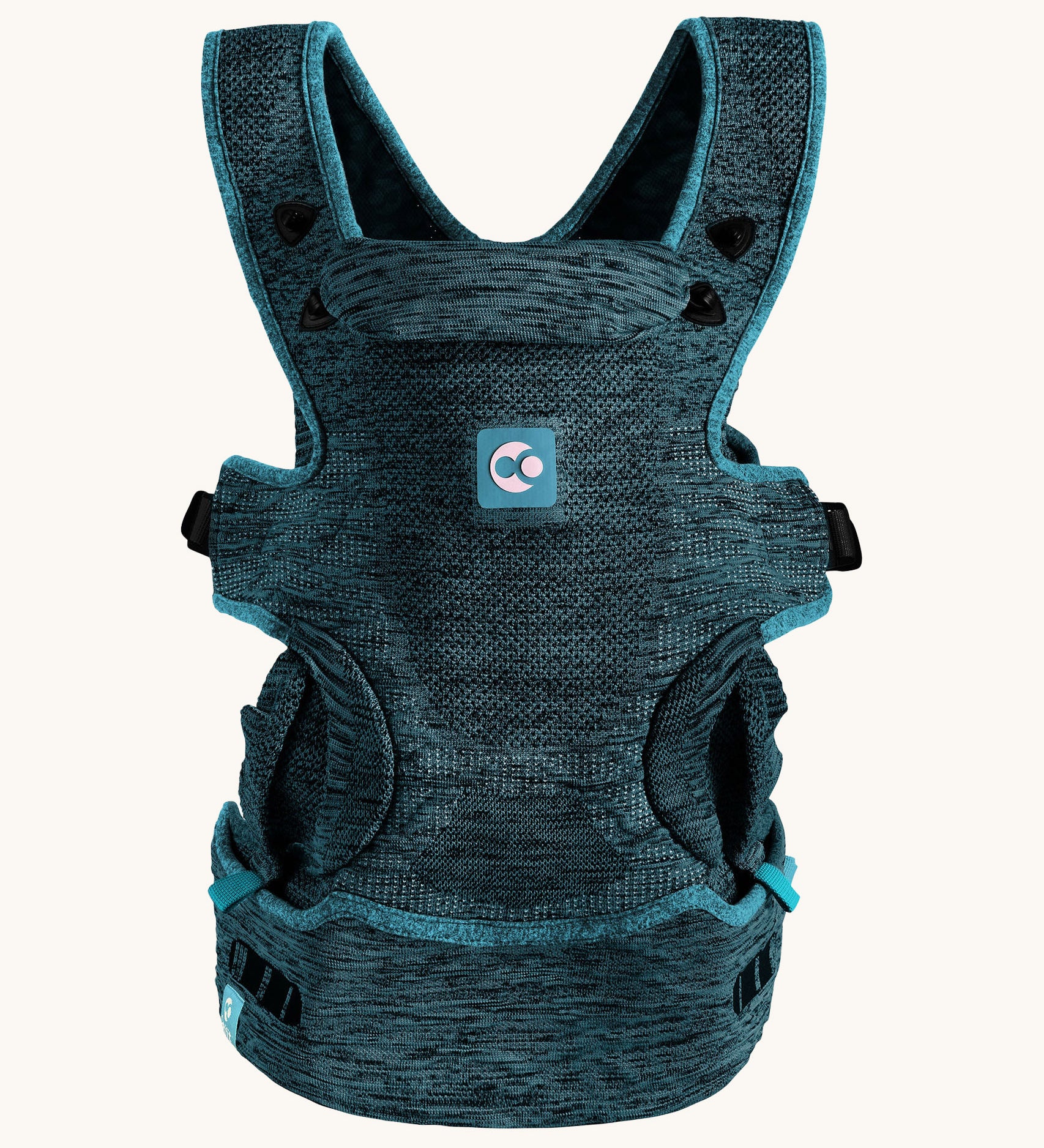 The Carifit+ Fabric Baby Carrier in Coll Green, sown from the front on a cream background