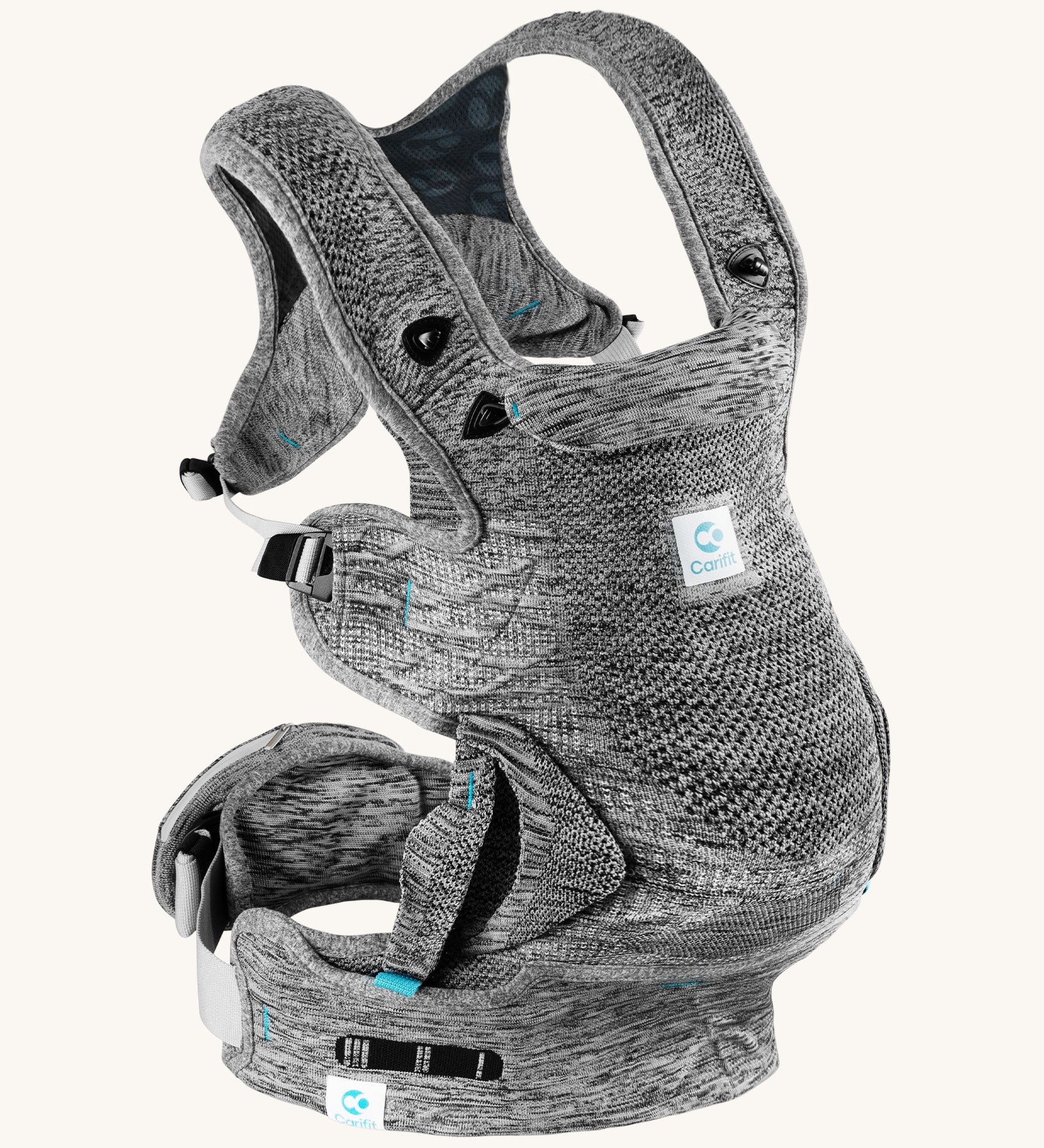 Carifit+ Fabric Baby Carrier in Grey, show from the side showing the adjustable straps, on a cream background