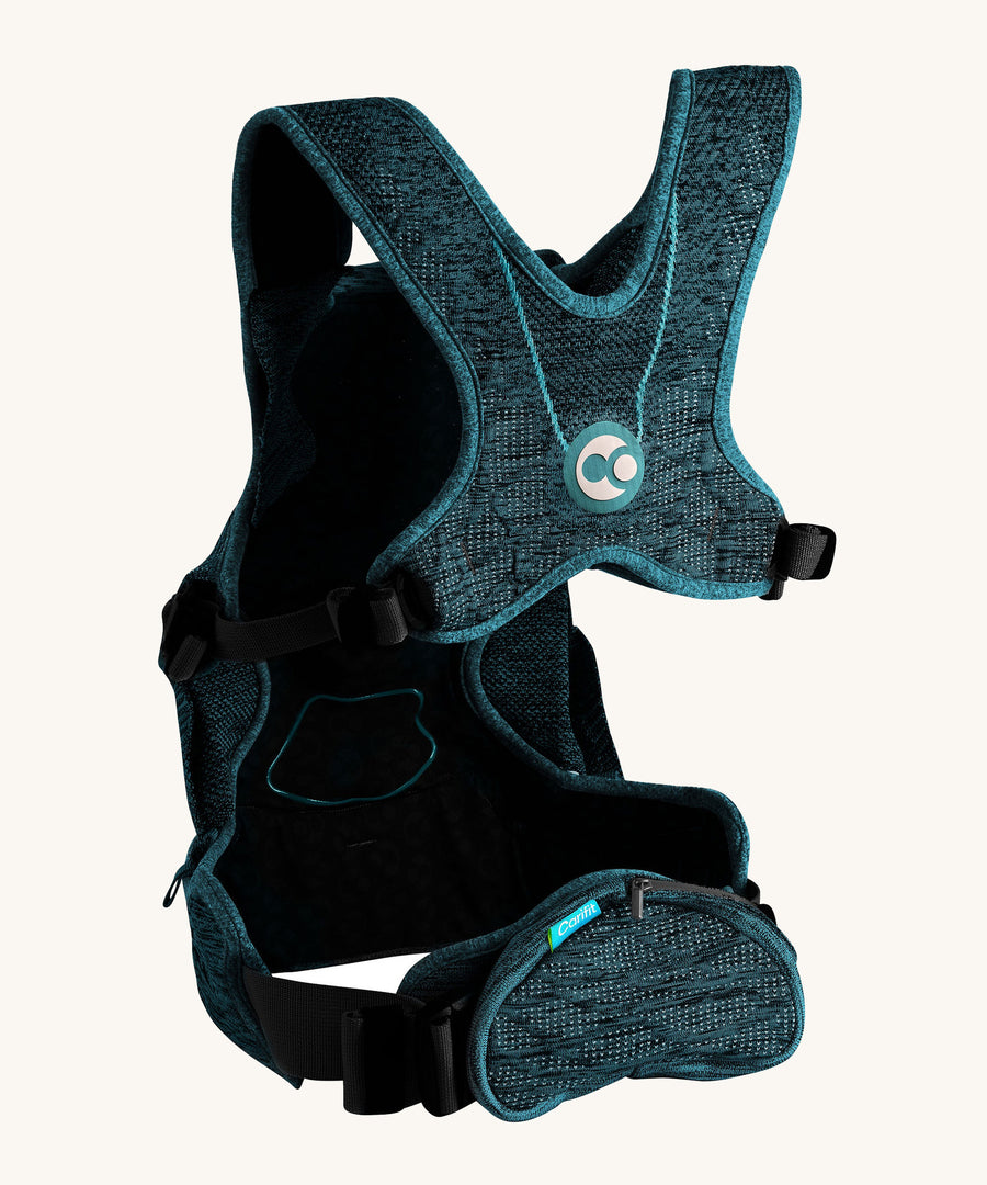 Th back of the Carifit+ Baby Carrier in Cool Green showing the supportive back panel, adjustable straps and zip up storage pouch, on a cream background