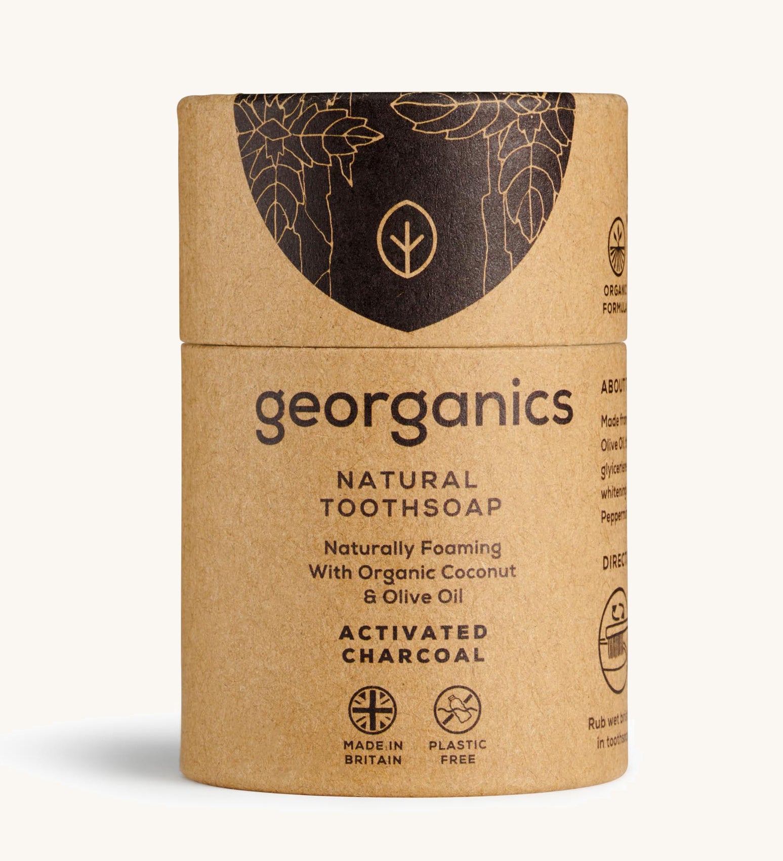 A Georganics charcoal toothsoap in cardboard packaging on a cream background