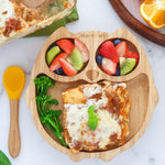 Eco Rascals Owl Bamboo Suction Plate with lasagna, broccoli and two portions of fruit salad, with and orange silicone and bamboo baby spoon. 