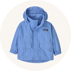 Patagonia rain coat on cream background to represent baby coats and snowsuits at Babipur.