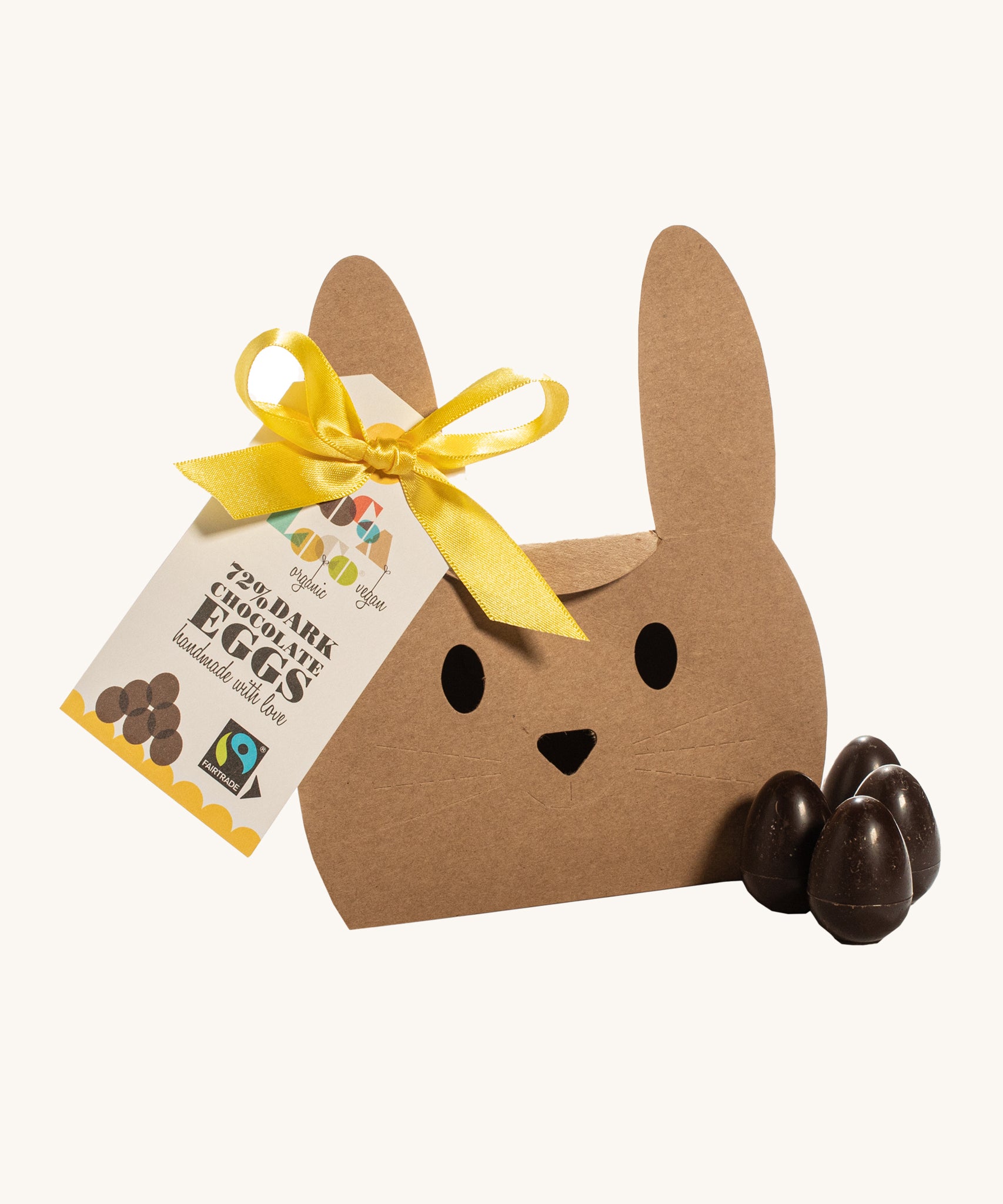 Cocoa Loco organic Fairtrade vegan mini dark chocolate eggs pictured with its bunny shaped eco-friendly packaging.