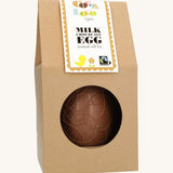 Cocoa Loco organic Fairtrade milk chocolate Easter egg, hand-decorated with delicate swirls. Presented in eco-friendly brown paper packaging with a clear window.