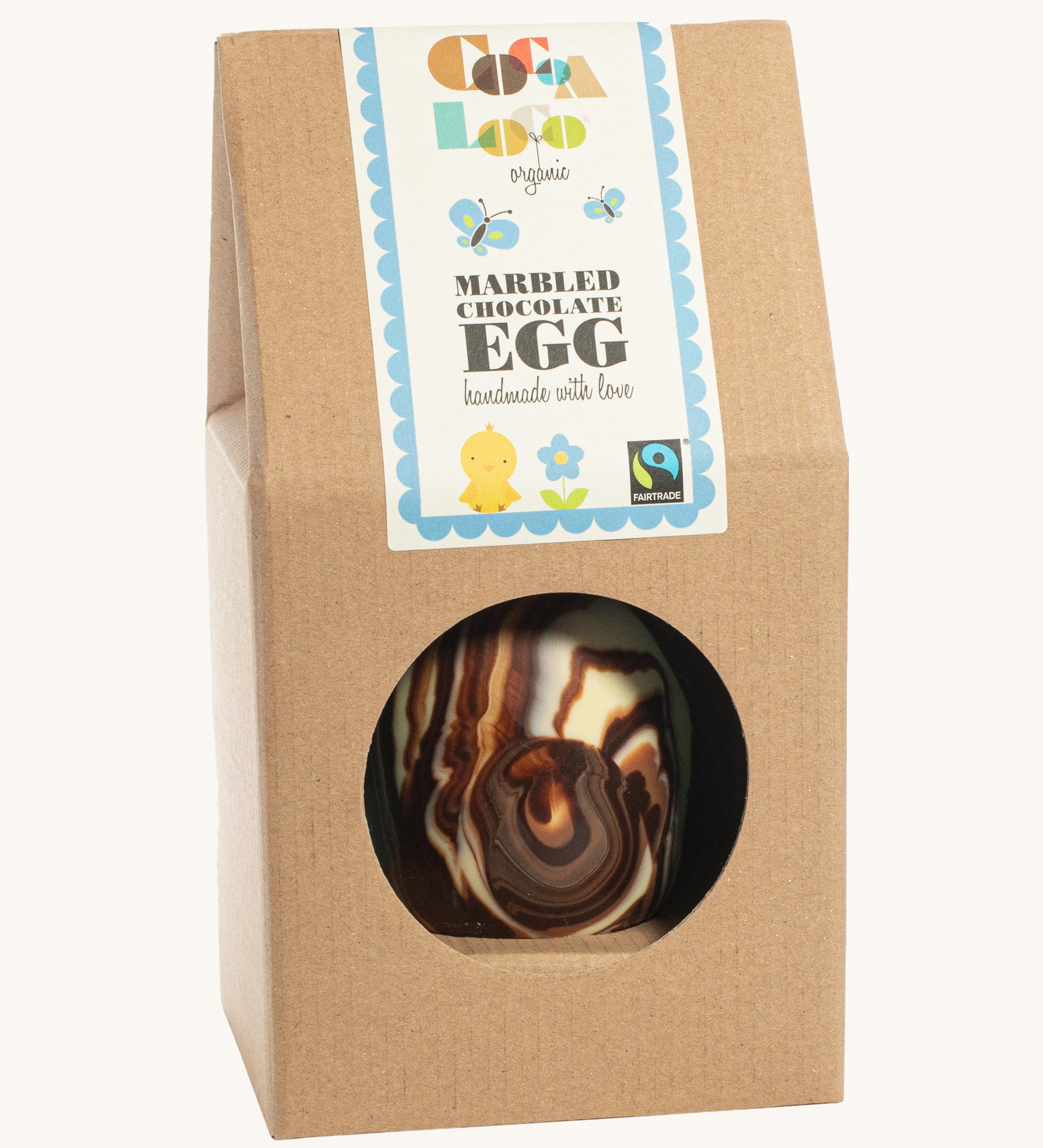 Cocoa Loco organic Fairtrade marbled Easter egg, handmade in the UK with swirls of milk, dark, and white chocolate. Presented in eco-friendly brown paper packaging.