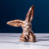 Cocoa Loco Marbled Fairtrade Chocolate Rabbit, a handmade blend of milk, dark and white chocolate with a striking swirl effect.