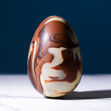 Cocoa Loco organic Fairtrade marbled Easter egg, a handmade blend of milk, dark, and white chocolate with a beautiful swirl effect. Made in the UK.