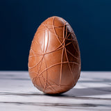 Cocoa Loco Fairtrade organic milk chocolate Easter egg, hand made with delicious chocolate swirls.